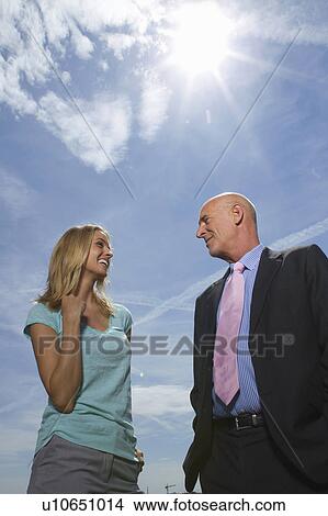 Business people talking outdoors View Large Photo Image Picture - Business people talking outdoors. Fotosearch