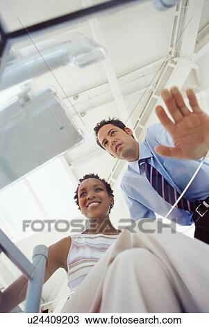 Business people working on computer View Large Photo Image Stock Image - Business people working on computer. Fotosearch