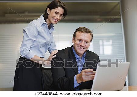 Business people working together View Large Photo Image Picture - Business people working together. Fotosearch