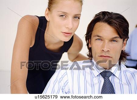 Stock Photo - Business people working together. Fotosearch