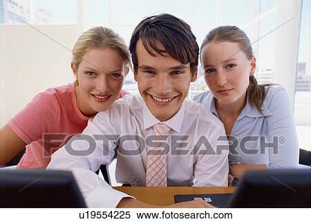 Stock Photography - Business people working together. Fotosearch