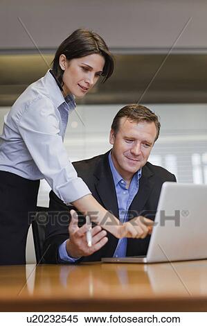 Business people working together View Large Photo Image Stock Photography - Business people working together. Fotosearch