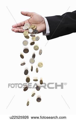 Businessman dropping Euro coins View Large Photo Image Stock Photograph - Businessman dropping Euro coins. Fotosearch