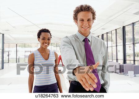 Businessman extending hand in greeting View Large Photo Image Stock Image - Businessman extending hand in greeting. Fotosearch