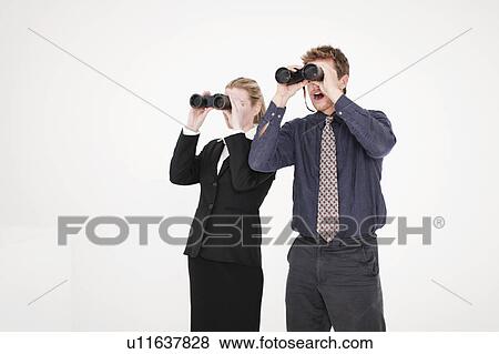 Stock Photo - Businesspeople using binoculars. Fotosearch