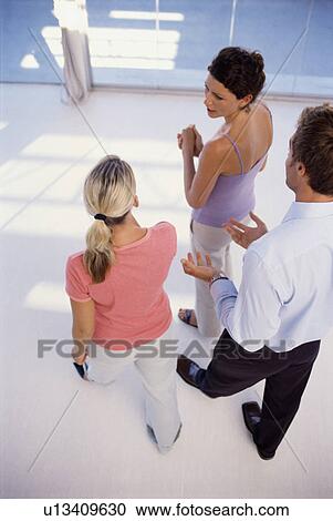 Businesspeople walking together View Large Photo Image Stock Image - Businesspeople walking together. Fotosearch
