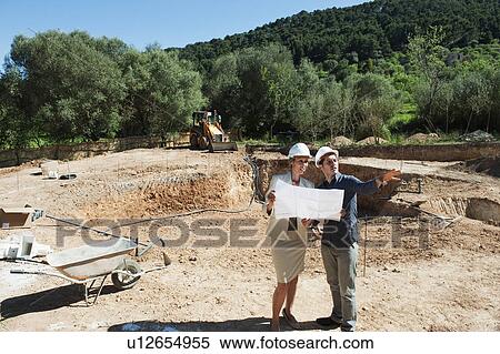 Businesswoman and foreman on site View Large Photo Image Stock Photography - Businesswoman and foreman on site. Fotosearch