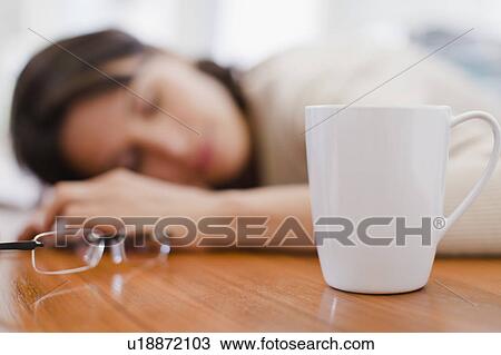Businesswoman asleep at desk View Large Photo Image Stock Image - Businesswoman asleep at desk. Fotosearch