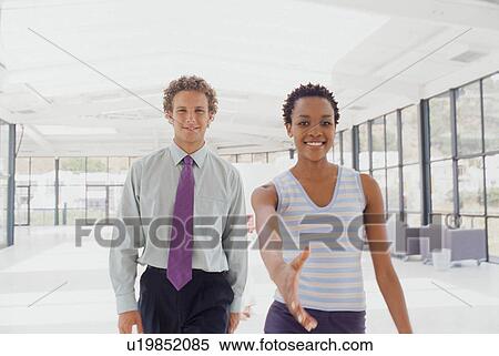 Businesswoman offering hand in greeting View Large Photo Image Stock Photography - Businesswoman offering hand in greeting. Fotosearch