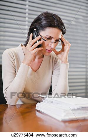 Businesswoman talking on cell phone View Large Photo Image Picture - Businesswoman talking on cell phone. Fotosearch