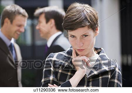 Stock Photograph - Businesswoman thinking outdoors. Fotosearch