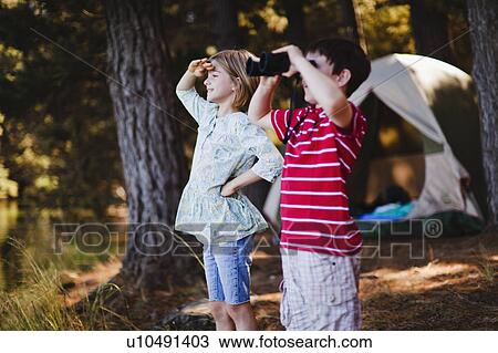 Children admiring view at campsite View Large Photo Image Stock Image - Children admiring view at campsite. Fotosearch