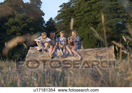 Children playing music together in field View Large Photo Image Picture - Children playing music together in field. Fotosearch