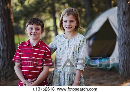 Children standing together at campsite View Large Photo Image Stock Photo - Children standing together at campsite. Fotosearch