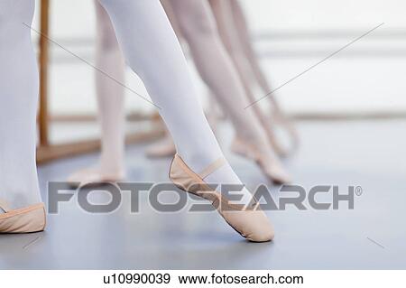 Stock Photo - Close up of ballet dancers’ feet. Fotosearch