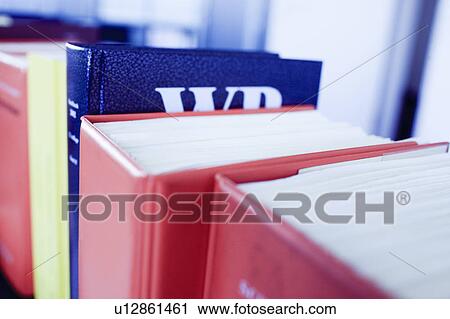 Close up of books on shelf View Large Photo Image Stock Image - Close up of books on shelf. Fotosearch