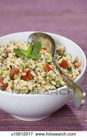 Stock Photo - Close up of bowl of tabbouleh. Fotosearch