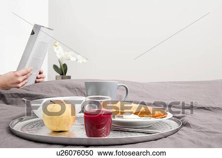 Close up of breakfast tray on bed View Large Photo Image Stock Image - Close up of breakfast tray on bed. Fotosearch