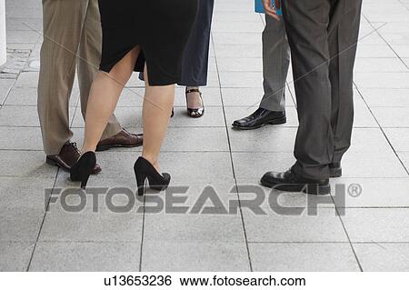Close up of business people's shoes View Large Photo Image Stock Photograph - Close up of business people's shoes. Fotosearch