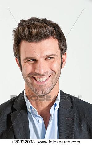 Stock Photo - Close up of businessman smiling. Fotosearch