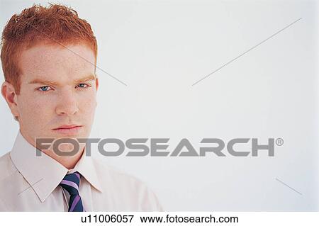 Close up of businessman’s serious face View Large Photo Image Stock Photo - Close up of businessman’s serious face. Fotosearch