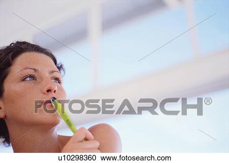 Close up of businesswoman thinking View Large Photo Image Stock Image - Close up of businesswoman thinking. Fotosearch