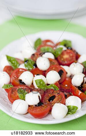 Close up of Caprese salad View Large Photo Image Stock Image - Close up of Caprese salad. Fotosearch