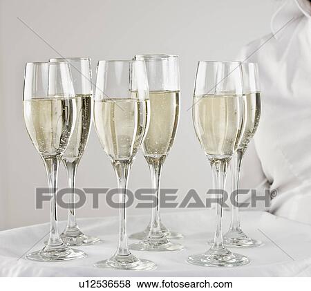 Close up of champagne in flutes View Large Photo Image Stock Photo - Close up of champagne in flutes. Fotosearch