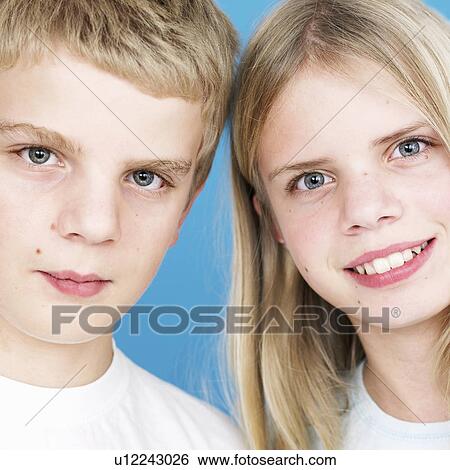 Stock Photograph - Close up of children’s smiling faces. Fotosearch