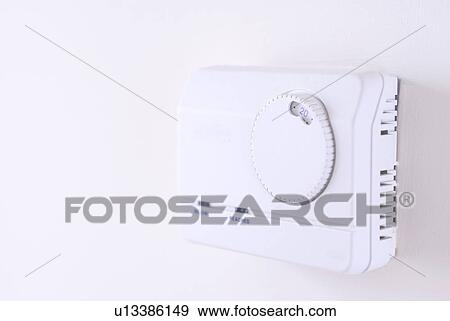 Stock Photo - Close up of climate control dial. Fotosearch