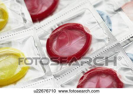 Close up of colorful condoms View Large Photo Image Stock Image - Close up of colorful condoms. Fotosearch