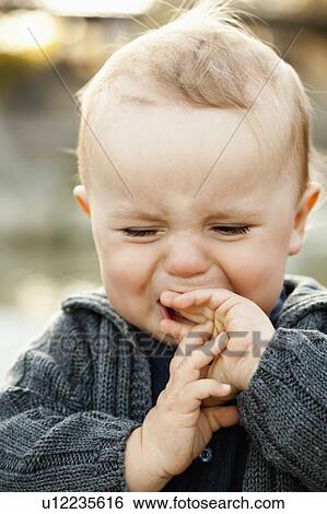 Close up of crying baby View Large Photo Image Stock Photograph - Close up of crying baby. Fotosearch