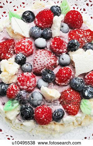 Stock Photo - Close up of fruit on cake. Fotosearch