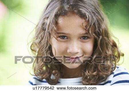 Close up of girl smiling View Large Photo Image Stock Image - Close up of girl smiling. Fotosearch