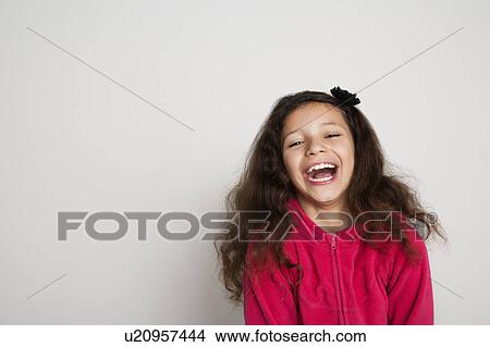 Close up of girl's laughing face View Large Photo Image Picture - Close up of girl's laughing face. Fotosearch
