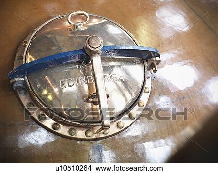 Close up of hatch on whisky still View Large Photo Image Picture - Close up of hatch on whisky still. Fotosearch
