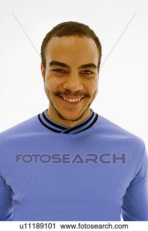 Close up of man's smiling face View Large Photo Image Stock Image - Close up of man's smiling face. Fotosearch