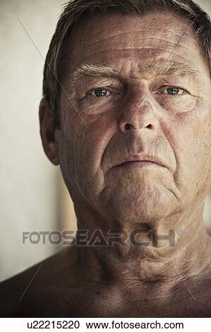 Stock Image - Close up of older man’s face. Fotosearch