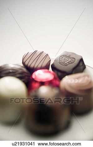 Close up of plate of chocolates View Large Photo Image Stock Image - Close up of plate of chocolates. Fotosearch