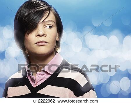 Close up of serious boy's face View Large Photo Image Stock Image - Close up of serious boy's face. Fotosearch