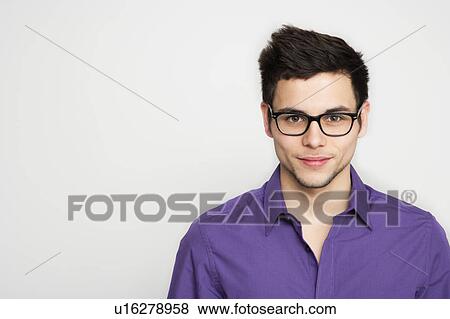 Stock Photo - Close up of serious man's face. Fotosearch