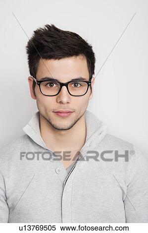 Stock Photography - Close up of serious man's face. Fotosearch