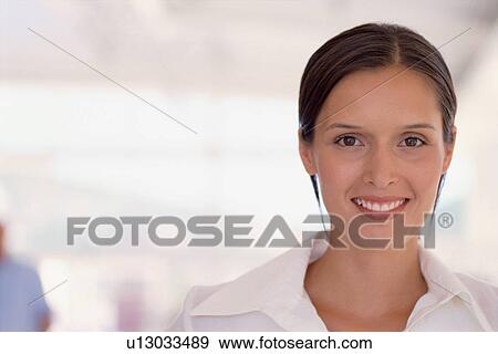 Stock Photo - Close up of smiling businesswoman. Fotosearch