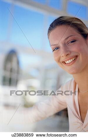 Stock Photo - Close up of smiling businesswoman. Fotosearch