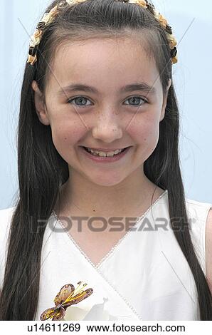 Stock Photo - Close up of smiling girl. Fotosearch