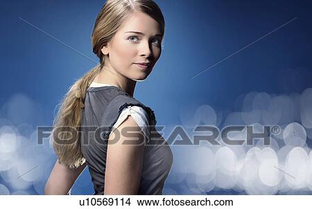 Picture - Close up of smiling girl's face. Fotosearch