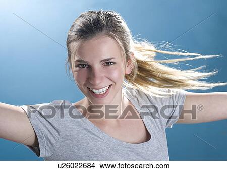 Picture - Close up of smiling woman. Fotosearch