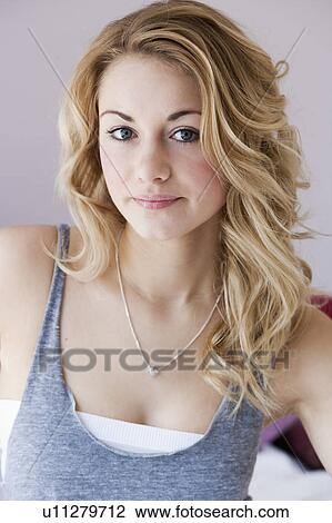 Stock Image - Close up of smiling woman. Fotosearch