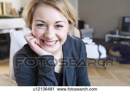Stock Image - Close up of smiling woman. Fotosearch