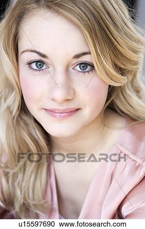 Stock Image - Close up of smiling woman. Fotosearch
